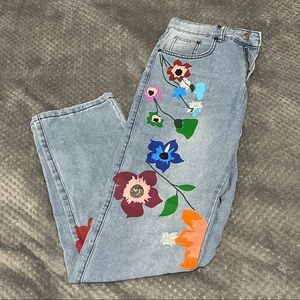 Floral painted jeans